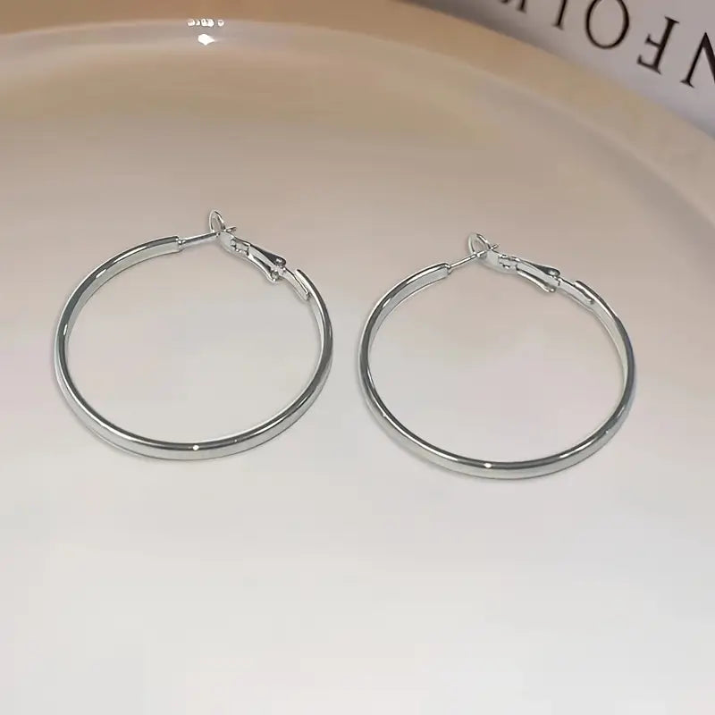 A Pair of Chic and Minimalist Silver Hoop Earrings