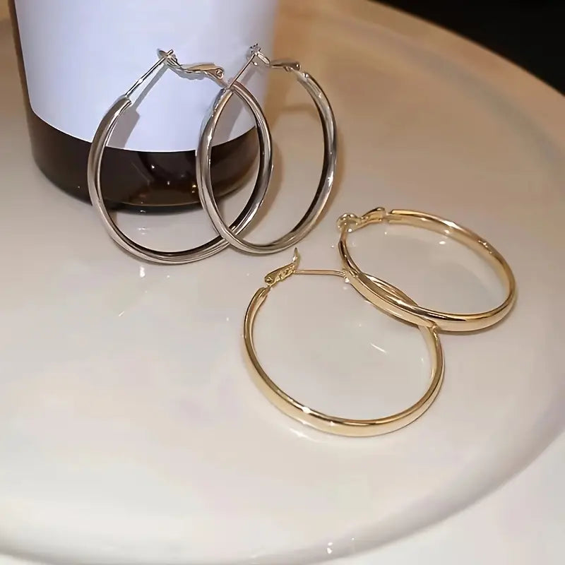 A Pair of Chic and Minimalist Silver Hoop Earrings