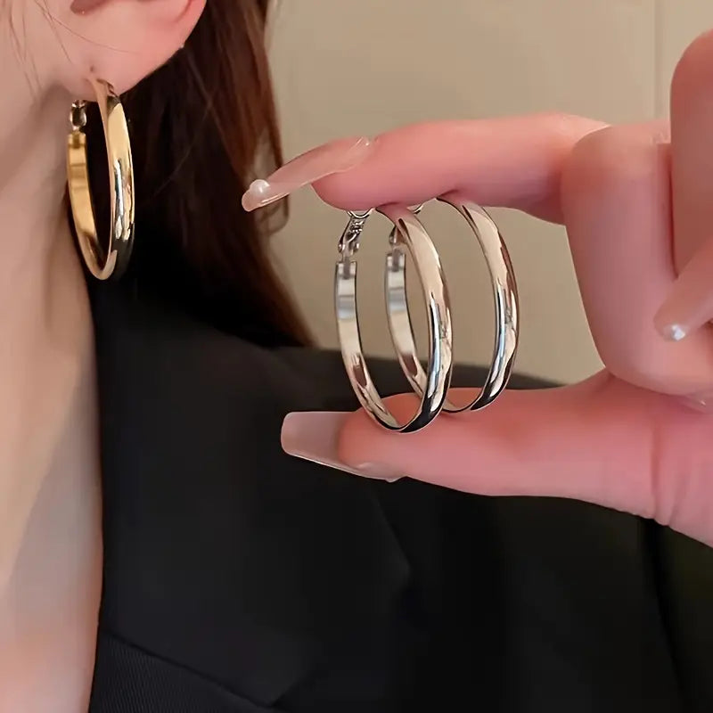 A Pair of Chic and Minimalist Silver Hoop Earrings